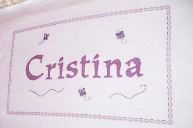 Cuadro con el nombre de Cristina en punto de cruz